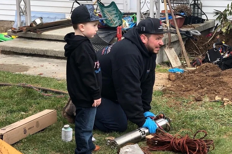 Joe Vitale and his son working together on a job